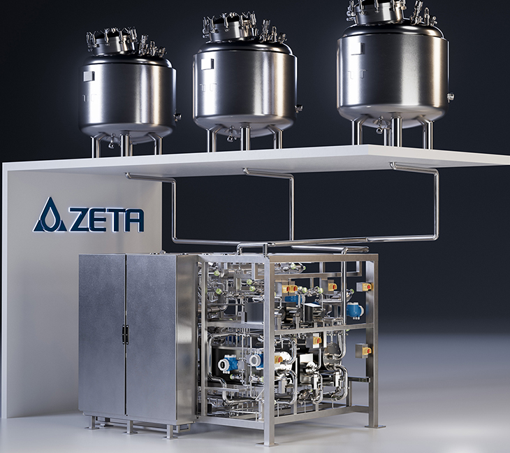 The image shows three large stainless steel tanks on a platform, connected by a network of pipes and valves. It’s part of a clean, high-tech industrial system, likely used in pharmaceutical, chemical, or food production. The brand “ZETA” is visible on the left side.