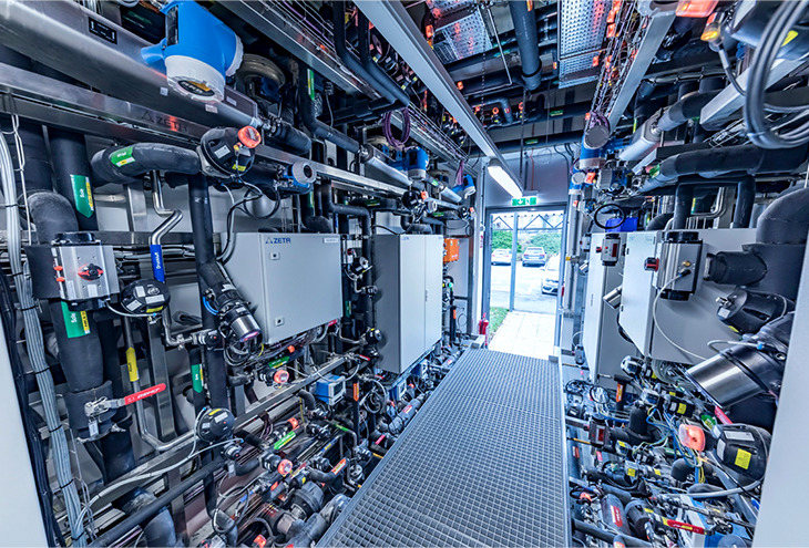 Technical area with corridor and open door facing outside